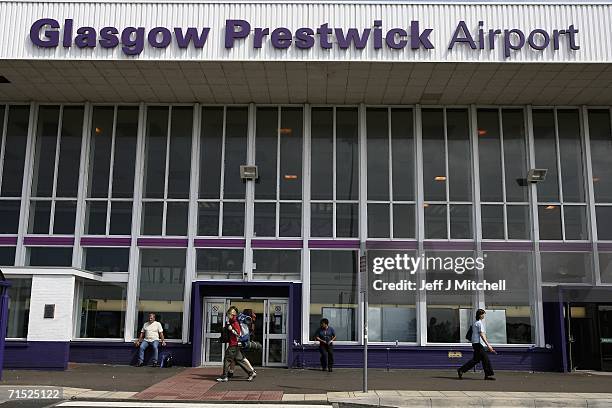 People walk past the enterance to Prestwick Airport July 27, 2006 in Prestwick, Scotland. Foreign Secretary Margaret Beckett protested July 26 the...
