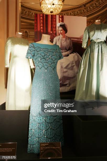 Silk chiffon dress designed by Sir Norman Hartnell for Queen Elizabeth II, at an exhibition of her dresses in the State Rooms of Buckingham Palace...