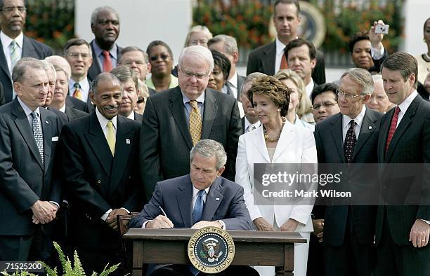 President George W. Bush signs The Fannie Lou Hamer, Rosa Parks, and Coretta Scott King Voting Rights Act Reauthorization and Amendments Act of 2006...