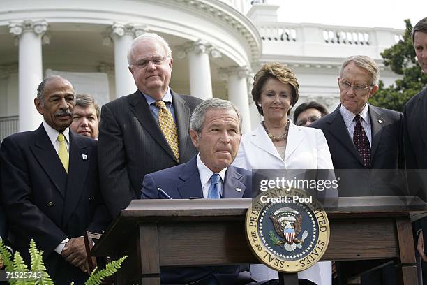 President George W. Bush signs the H.R. 9, the Fannie Lou Hammer, Rosa Parks, and Coretta Scott King Voting Rights Act Reauthorization and Amendments...