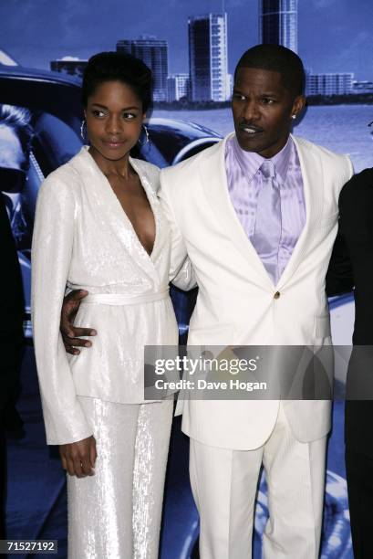 Actors Naomie Harris and Jamie Foxx arrive at the European premiere of "Miami Vice" at Odeon Leicester Square on July 27, 2006 in London, England.