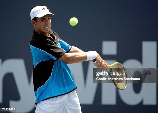 Dominik Hrbaty of Slovakia eyes a backhand to Lars Burgsmuller of Germany during the Countrywide Classic on July 27, 2006 in Straus Stadium at the...