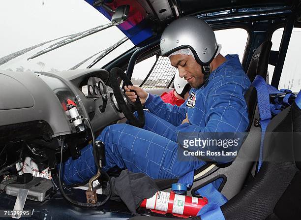 Neemia Tealata of the All Blacks gets behind the wheel of a V8 Supercar during a visit to the Performance Driving Centre of the Gold Coast on July...