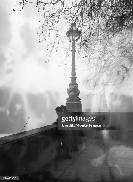 Mid-morning smog, as seen from the embankment at Blackfriars, London, 5th December 1952.