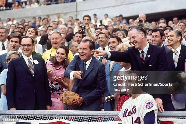 President Richard Nixon throws out first pitch at 1970 All-Star Game Riverfront Stadium on July 14, 1970 in Cincinnati, Ohio. Commissioner Bowie Kuhn...