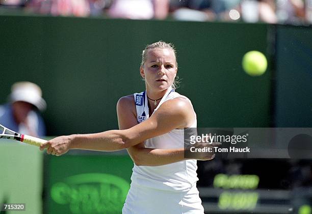 Anne-Gaelle Sidot returns the ball in a match against Lindsay Davenport during the Estyle.com Classic at the Manhattan Country Club in Manhattan...