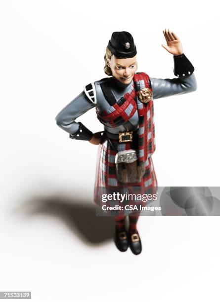 plastic figurine of a scottish woman - piper stock pictures, royalty-free photos & images