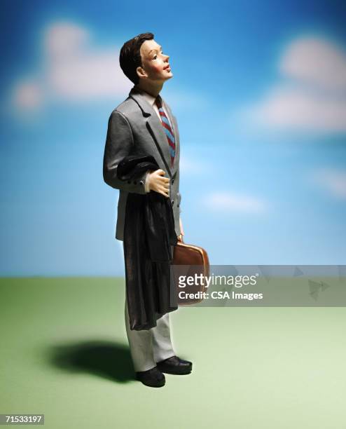 plastic figurine of a businessman - figurine 個照片及圖片檔