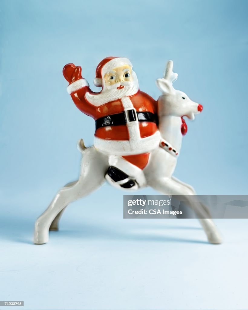 Plastic Santa Claus and Reindeer