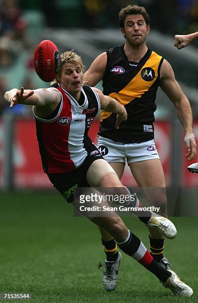 Nick Riewoldt for St Kilda and Joel Bowden for Richmond in action during the round 17 AFL match between the St Kilda Saints and the Richmond Tigers...