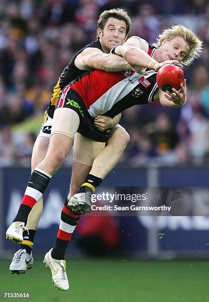 Nick Riewoldt for St Kilda and Joel Bowden for Richmond in action during the round 17 AFL match between the St Kilda Saints and the Richmond Tigers...