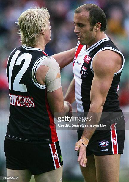 Fraser Gehrig is congratulated by Nick Riewoldt for St Kilda after kicking a goal during the round 17 AFL match between the St Kilda Saints and the...