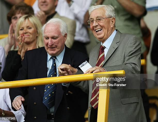 Aston Villa chairman Doug Ellis with Wolves President Sir Jack Haywood watch the teams come out during the Pre-season friendly match between...