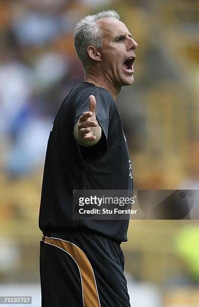 Wolves manager Mick McCarthy encourages his side from the sidelines prior to the Pre-season friendly match between Wolverhampton Wanderers and Aston...