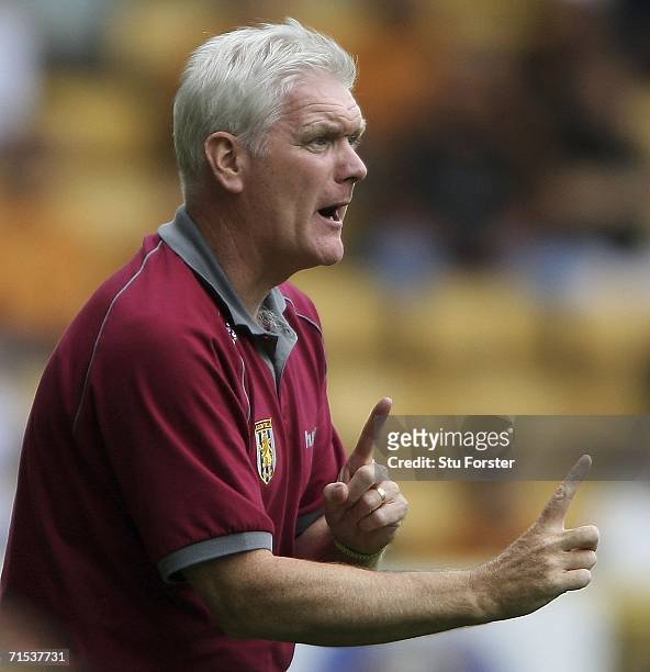 Aston Villa caretaker manager Roy Aitken makes a point from the sidelines during the Pre-season friendly match between Wolverhampton Wanderers and...