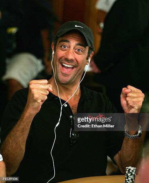 Actor/comedian Brad Garrett jokingly reacts after it was announced that poker player Phil Hellmuth had been eliminated on the second day of the first...
