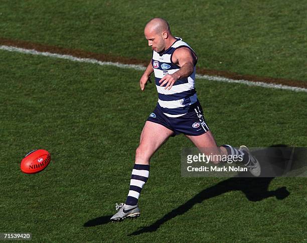Paul Chapman of Geelong in action during the round 17 AFL match between the Kangaroos and the Geelong Cats played at Manuka Oval on July 30, 2006 in...