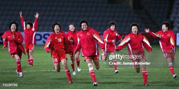 The Chinese team celebrate after winning the AFC Womens Asian Cup final match between Australia and China at Hindmarsh Stadium on July 30, 2006 in...