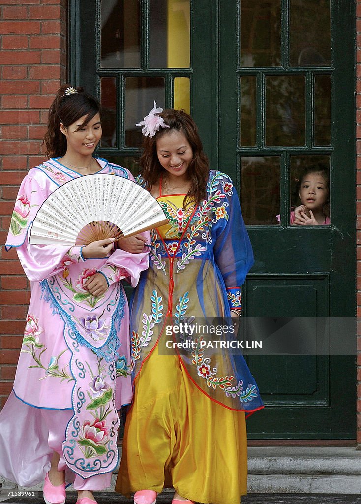 Taiwanese women dressed up as martial ar