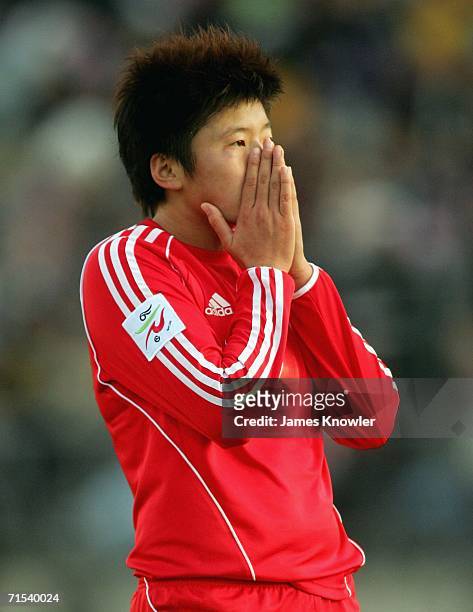 Xiaoxu Ma of China reacts after missing a goal during the AFC Women's Asian Cup final match between Australia and China at Hindmarsh Stadium on July...