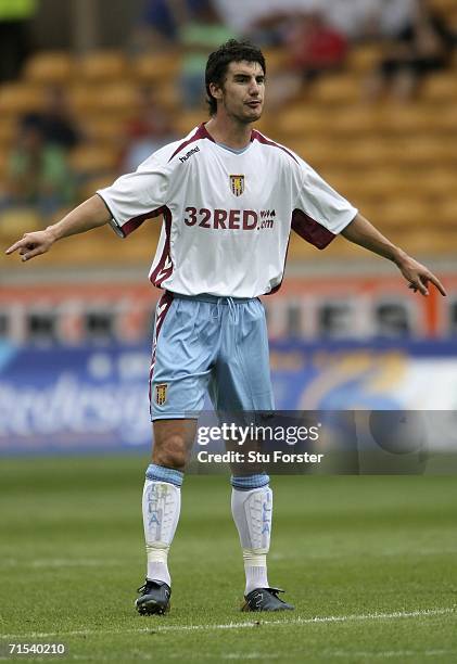 Aston Villa defender Liam Ridgewell organises the defence during the Pre-season friendly match between Wolverhampton Wanderers and Aston Villa at...