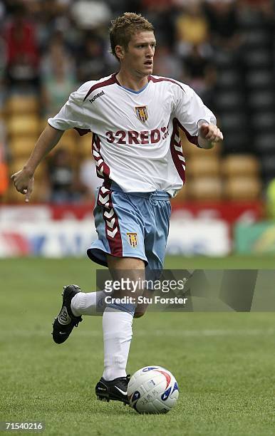 Aston Villa midfielder Steve Davis runs with the ball during the Pre-season friendly match between Wolverhampton Wanderers and Aston Villa at...