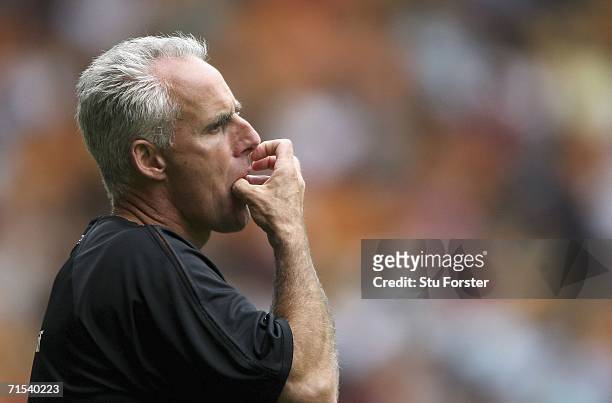 Wolves manager Mick McCarthy watches from the sidelines during the Pre-season friendly match between Wolverhampton Wanderers and Aston Villa at...