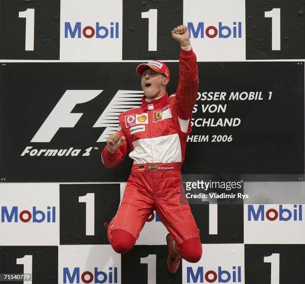 Michael Schumacher of Germany and Ferrari celebrates after winning the German Formula One Grand Prix at the Hockenheimring on July 30, 2006 in...