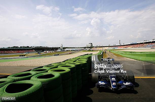 Nico Rosberg?s Williams is seen parked at the side of the track after his crash during the German Formula One Grand Prix at the Hockenheimring on...