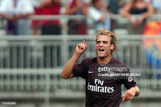 S French midfielder Jerome Rothen jubilates after he scored a goal, 30 July 2006 at Gerland Stadium in Lyon, central eastern France, during their...