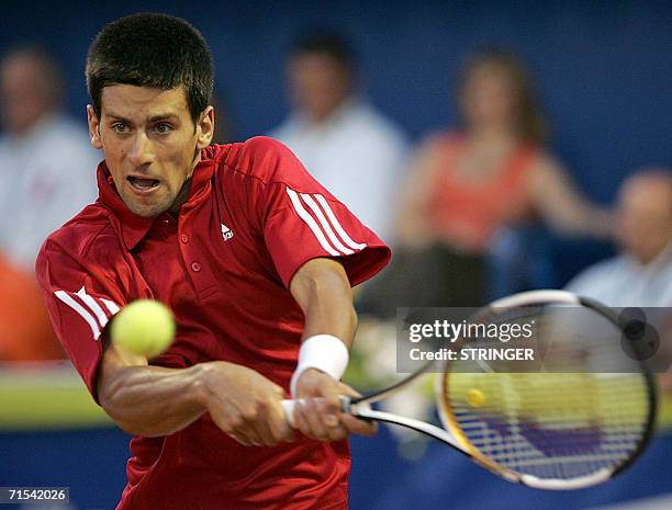 Novak Djokovic from Serbia returns a backhand during his ATP Tour final match against Stanislas Wawrinka from Switzerland, in Umag, 30 July 2005. AFP...