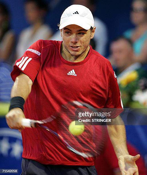 Stanislas Wawrinka from Switzerland returns a backhand during his ATP Tour final match against Novak Djokovic from Serbia, in Umag, 30 July 2005. AFP...