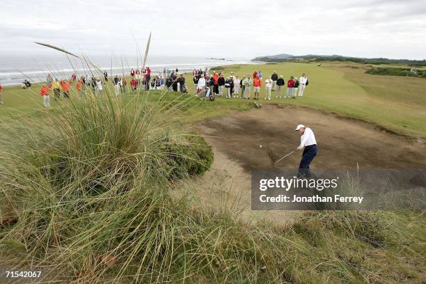 Amanda Blumenherst of the United States hits out of the Bunker on the 4th hole en route to losing her match with teammate Paige Mackenzie 1 UP to...