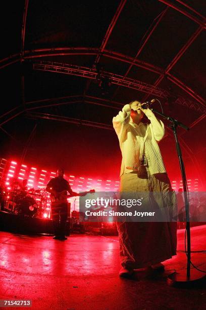 Singer Liz Frazer performs live on stage with Massive Attack at Westonbirt Arboretum on July 30, 2006 in Tetbury England.