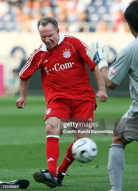 Karl-Heinz Rummenigge of Bayern Munich scores a goal during the friendly match between Urawa Red Diamonds All Stars and Bayern Munich All Stars on...