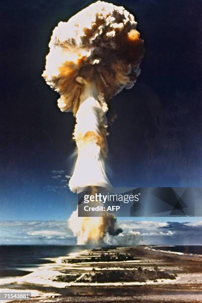 Mururoa, FRENCH POLYNESIA: This picture taken in 1970 shows a French nuclear test at Mururoa, French Polynesia. Researchers have established a link...