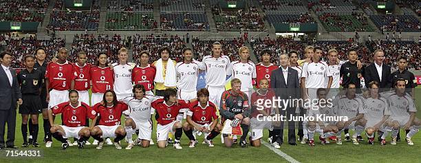 Players of Bayern Munich and Urawa Red Diamonds pose for photographs during the friendly match between Urawa Red Diamonds All Stars and Bayern Munich...