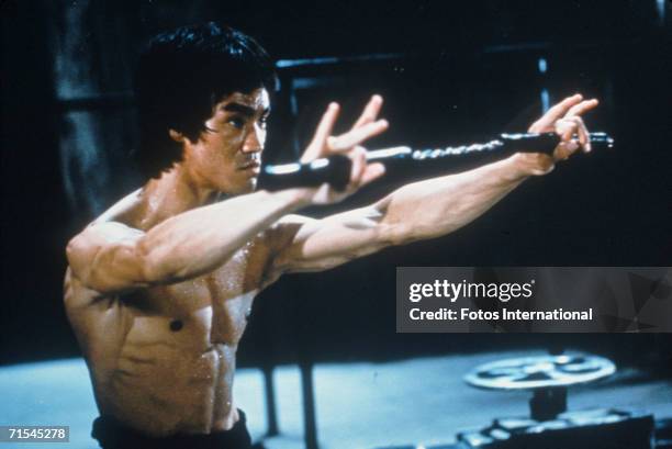 Chinese-American martial arts exponent Bruce Lee , in a still from the film 'Enter The Dragon', directed by Robert Crouse for Warner Brothers, 1973.