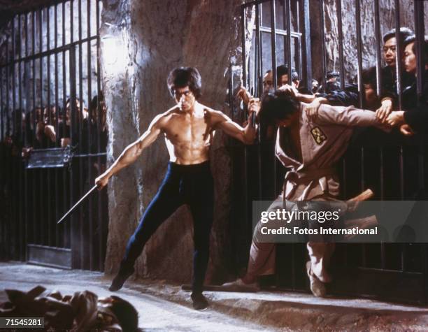 Chinese-American martial arts exponent Bruce Lee , in a still from the film 'Enter The Dragon', directed by Robert Crouse for Warner Brothers, 1973.