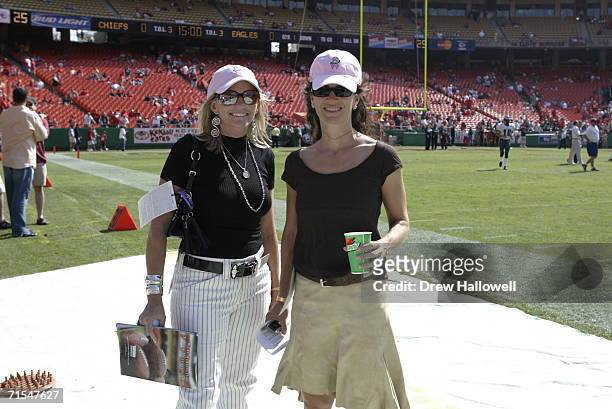 Tami Reid , wife of coach Andy Reid, and Christina Weiss Lurie , wife of owner Jeffrey Lurie of the Philadelphia Eagles, pose for a photograph on...