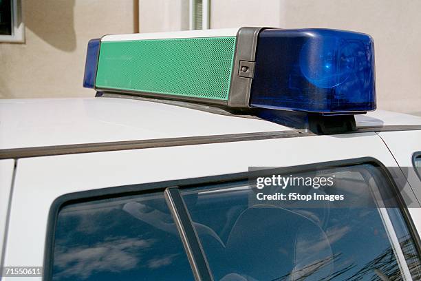 lights on top of police car - spartan cruiser stock pictures, royalty-free photos & images