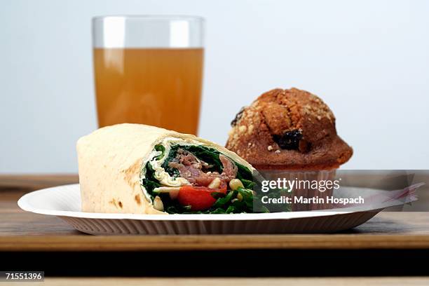 wrap sandwich, muffin and ice tea on tray - eaten salad stock pictures, royalty-free photos & images