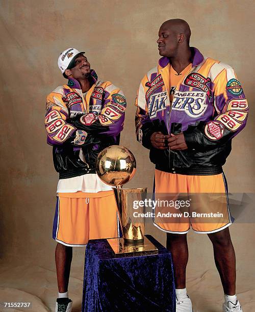 Shaquille O'Neal and Kobe Bryant of the Los Angeles Lakers pose for a photo after winning the NBA Championship on June 19, 2000 at the Staples Center...