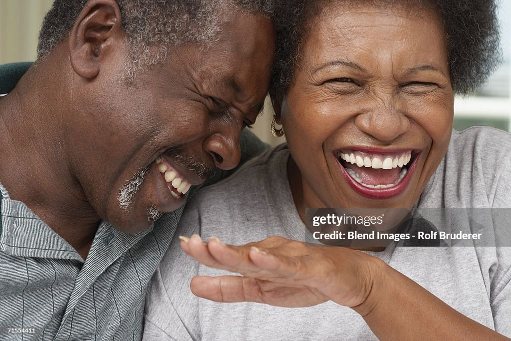 Close up of senior African American couple laughing