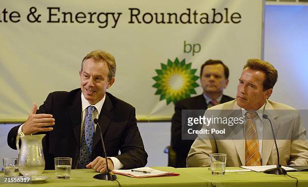 British Prime Minister Tony Blair and California Gov. Arnold Schwarzenegger participate in a roundtable discussion July 31, 2006 at the Port of Long...