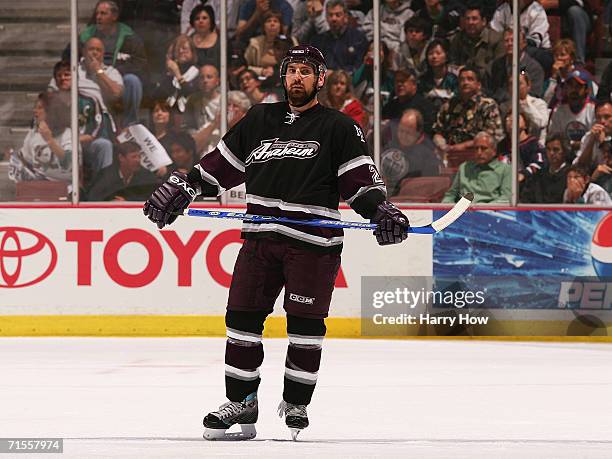 Francois Beauchemin of the Mighty Ducks of Anaheim looks on during a break in play in game five of the NHL Western Conference Finals against the...