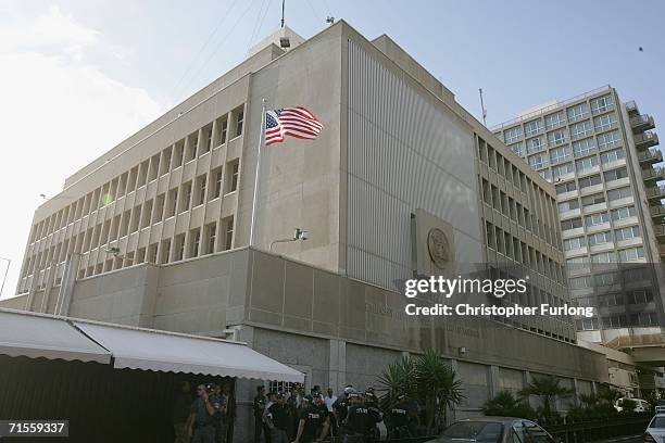 The Stars and Stripes flies outside The United States Embassy during a demonstration against Israel 's offensives in Lebanon on August 1 in Tel Aviv,...