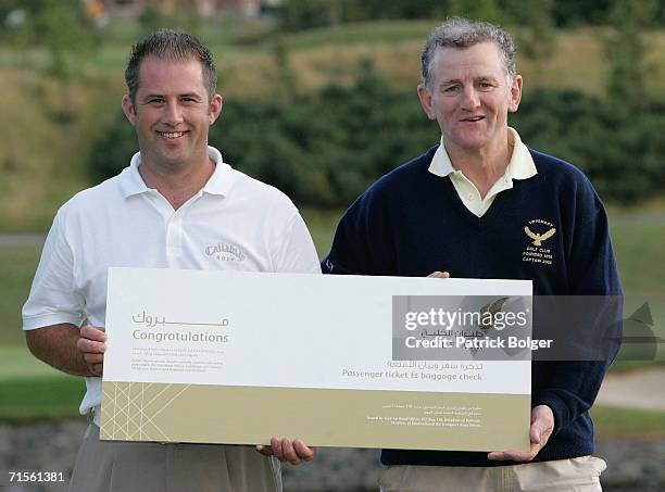 Winners of the Ireland qualifier, Gerard Jones and Pat Kelly of Tipperary Golf Club, pose followin round one of the Gulf Air Pro Captain Qualifier at...