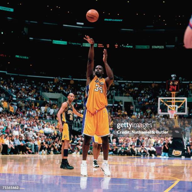 Shaquille O'Neal of the Los Angeles Lakers attempts a free throw against the Indiana Pacers during Game Two of the 2000 NBA Finals on June 9, 2000 at...