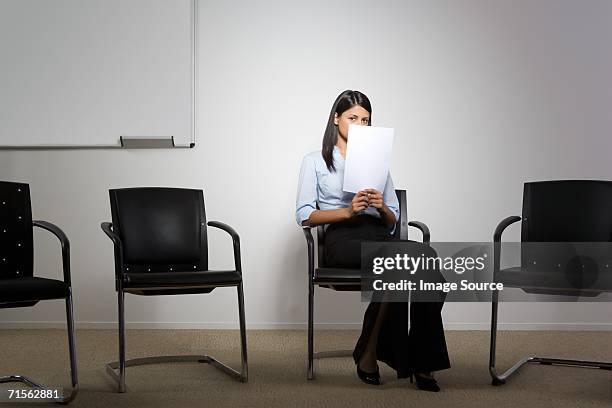 nervous office worker - shy stock pictures, royalty-free photos & images